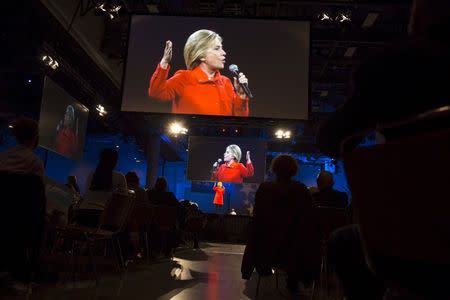 Democratic presidential candidate Hillary Clinton speaks during the 2015 Jefferson-Jackson Dinner with fellow candidates Martin O'Malley and Bernie Sanders in Des Moines, Iowa, October 24, 2015. REUTERS/Scott Morgan