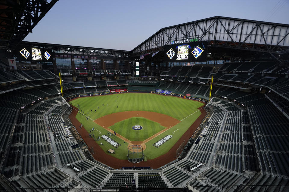 The Tampa Bay Rays practice at Globe Life Field with the roof open as the team prepares for the baseball World Series against the Los Angeles Dodgers, in Arlington, Texas, Wednesday, Oct. 14, 2020. (AP Photo/Eric Gay)