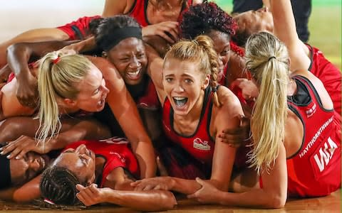 Helen Housby (C), who scored in the final second and her England teammates celebrate at full time and winning the Netball Gold Medal Match between England and Australia - Credit: Scott Barbour/Getty Images