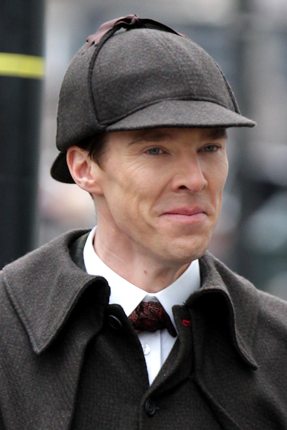 Benedict in vintage attire with herringbone cap and coat, and patterned tie