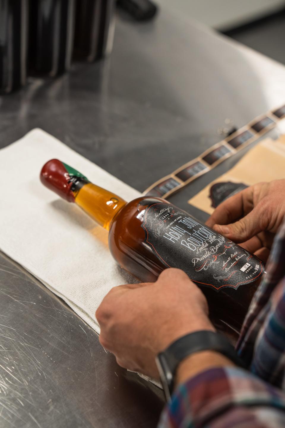 The J. Mattingly 1845 Holiday Custom Bourbon Experience allows customers to create blends for customized bottles this holiday season.