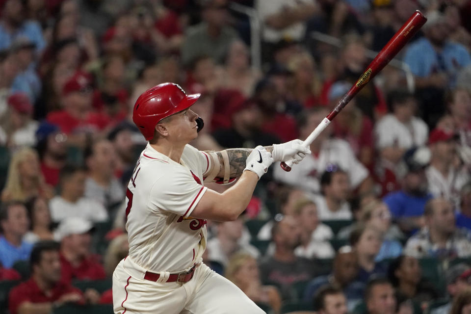 St. Louis Cardinals' Tyler O'Neill watches his two-run home run during the eighth inning of a baseball game against the San Diego Padres Saturday, Sept. 18, 2021, in St. Louis. (AP Photo/Jeff Roberson)