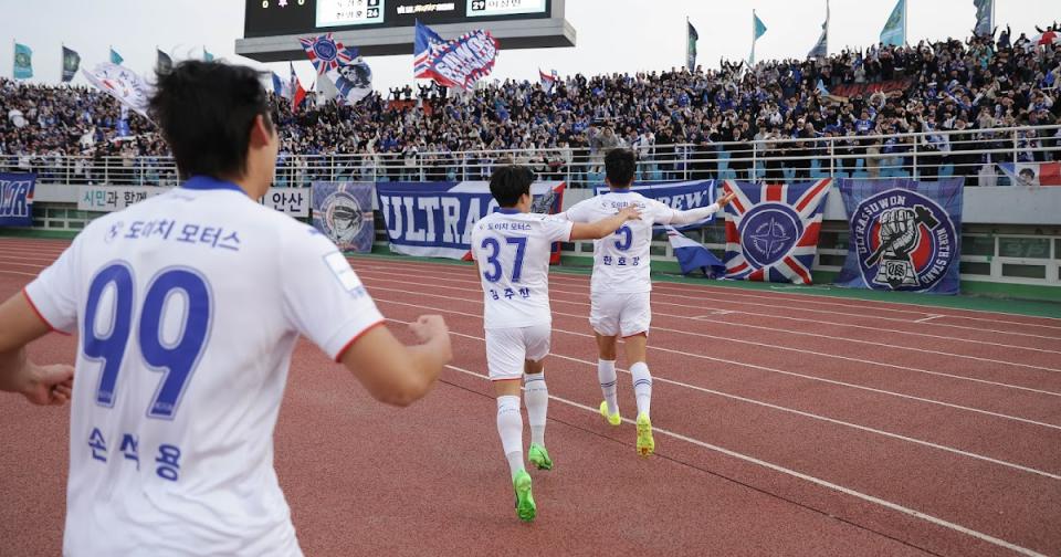 Suwon up to third after surviving late scare