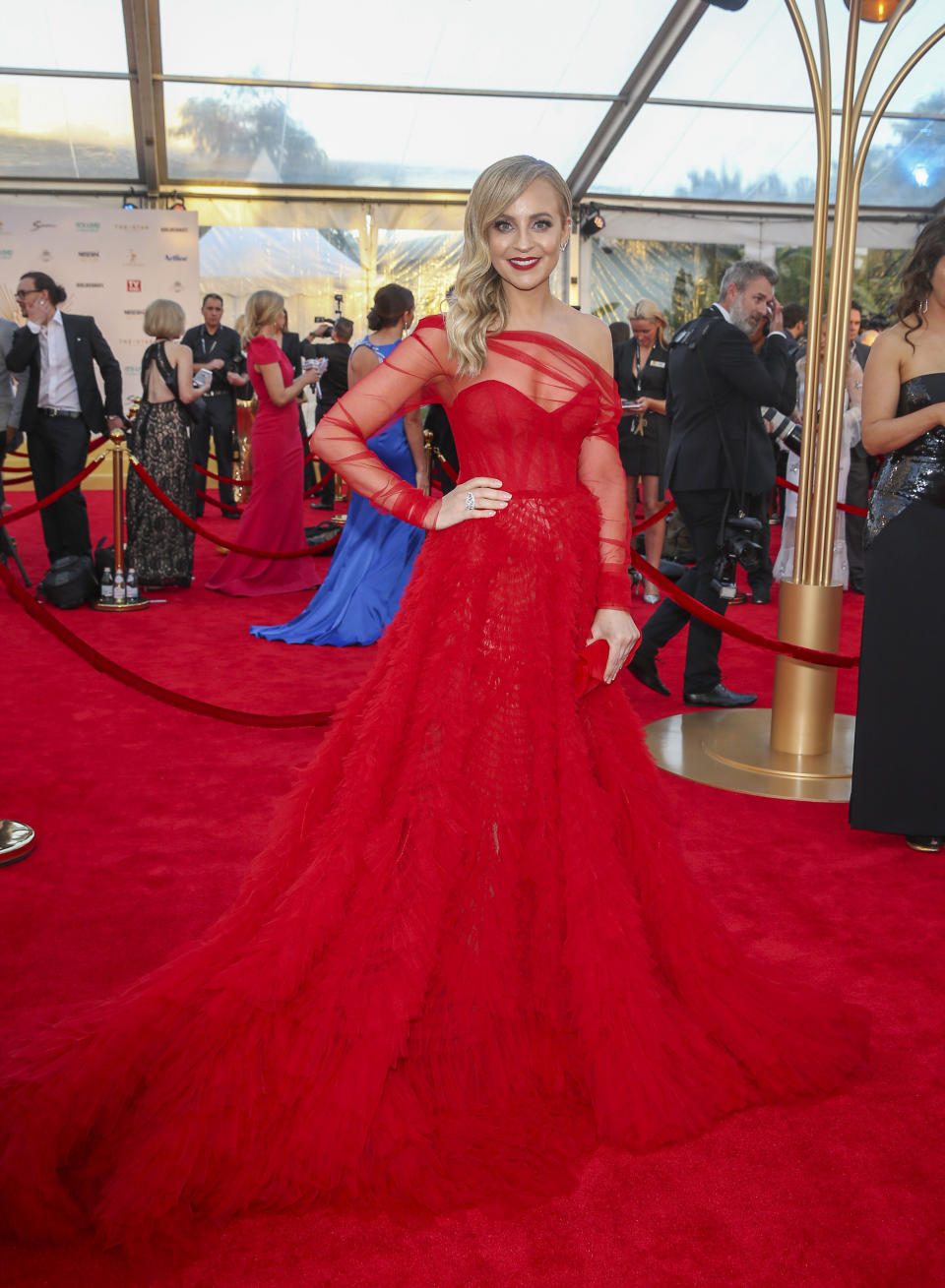 The Project host Carrie Bickmore looks glowing in this scarlet number. Photo: Media Mode