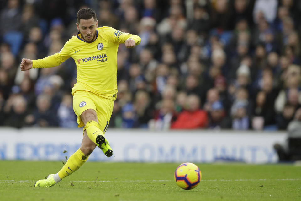 Chelsea’s Eden Hazard scores his side’s second goal during the English Premier League soccer match between Brighton and Hove Albion and Chelsea at the Amex Stadium in Brighton, England, Sunday, Dec. 16, 2018. (AP Photo/Matt Dunham)