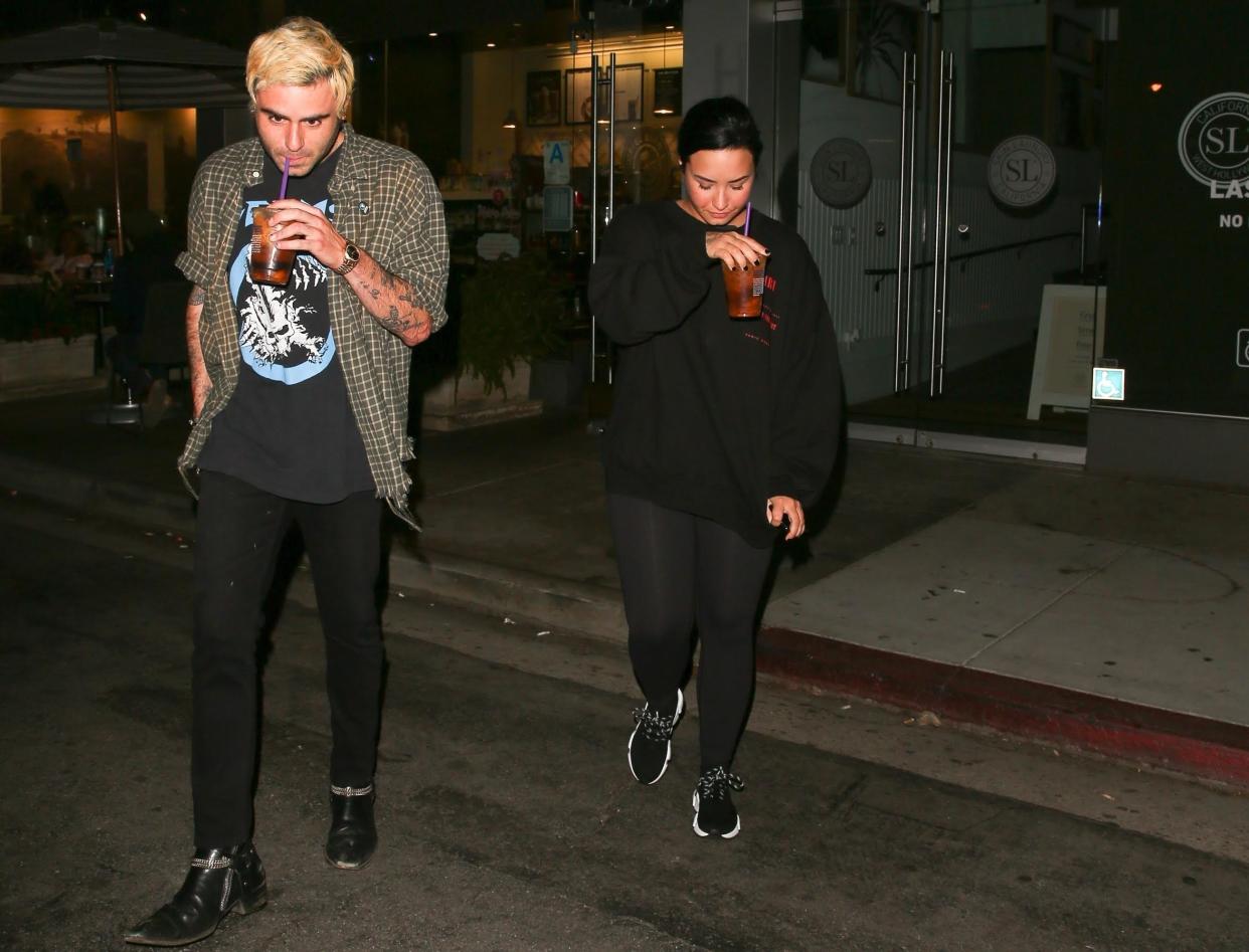 Demi Lovato is spotted with a new man by her side, Henry Levy, after they grabbed drinks together in West Hollywood, Calif. (Photo: Backgrid)