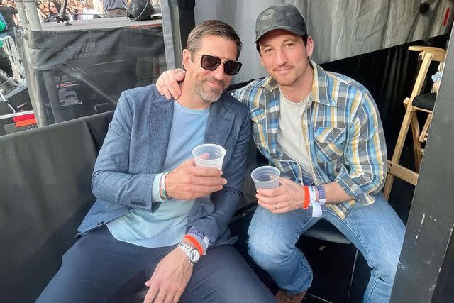 Aaron Rodgers and Miles Teller