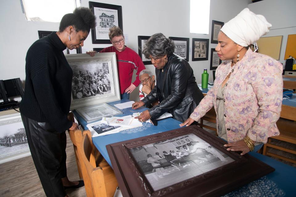 Robin Reshard, Joe Vinson, Marion Williams, Dianne P Robinson, and Teniade Broughton compile documents as the group researches candidates to include in its Obituary project during a meeting at the Kukua Institute on Wednesday, Jan. 11, 2023. The group, which also includes C. Scott Satterwhite and Jamin Wells, is partnering with the Pensacola News Journal to publish obituaries of once marginalized Pensacola residents from the past who were denied proper obituaries.