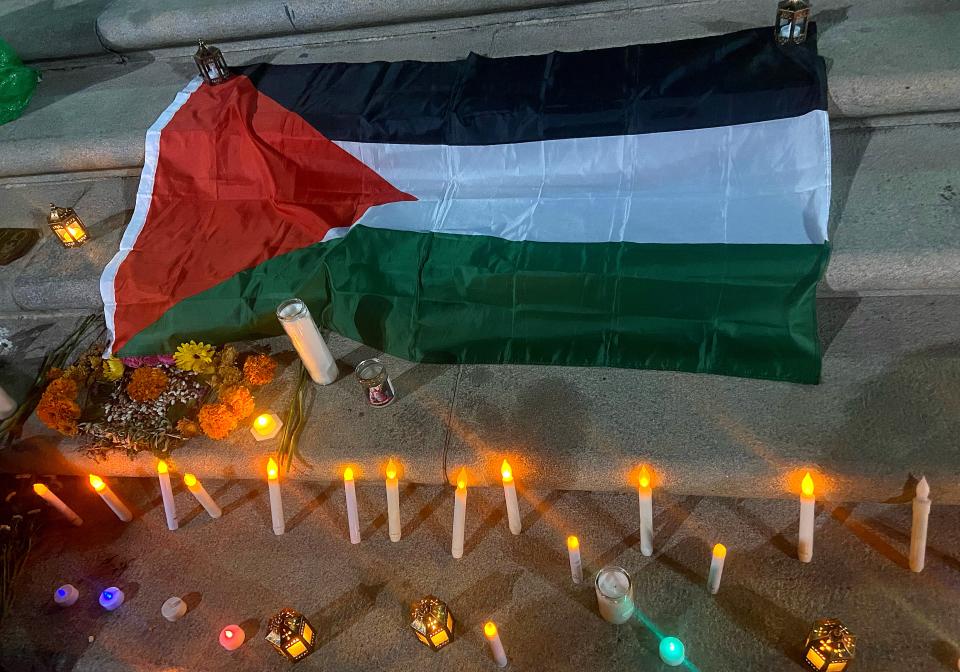 The University of Texas at Austin's Palestinian Solidarity Committee holds an emergency vigil in mourning for Palestinian lives lost in the Israel-Hamas war at the Tower Plaza Wednesday, Oct. 18, 2023.