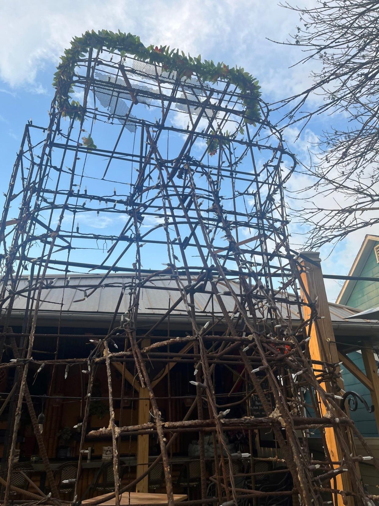 The rebar skeleton of a moai head that stood outside the Kahiki Supper Club for 39 years stands guard on the back patio of Huli Huli Tiki Lounge in Powell.