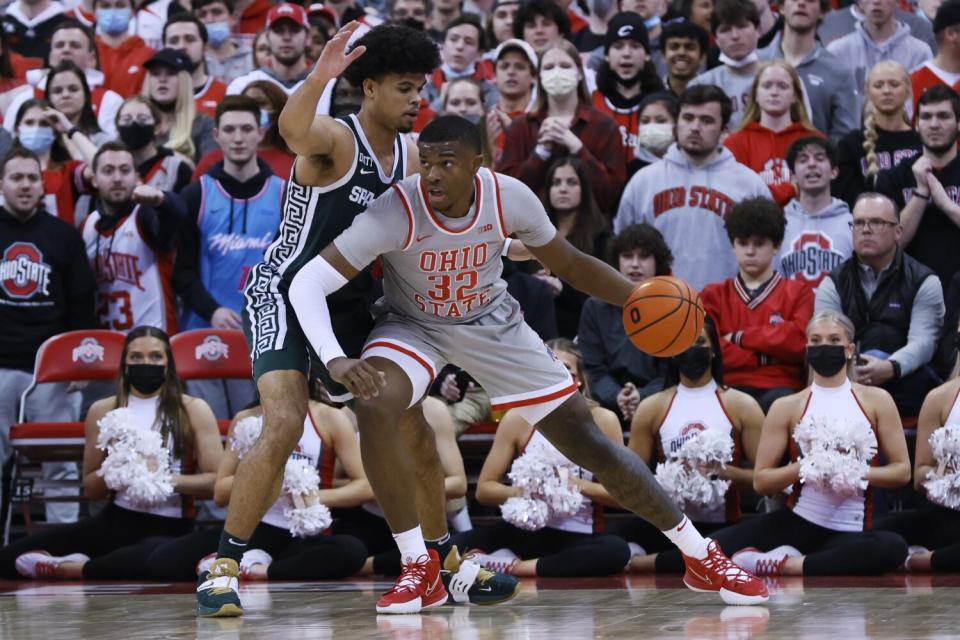 Ohio State forward E.J. Liddell works in the post against Michigan State's Malik Hall.