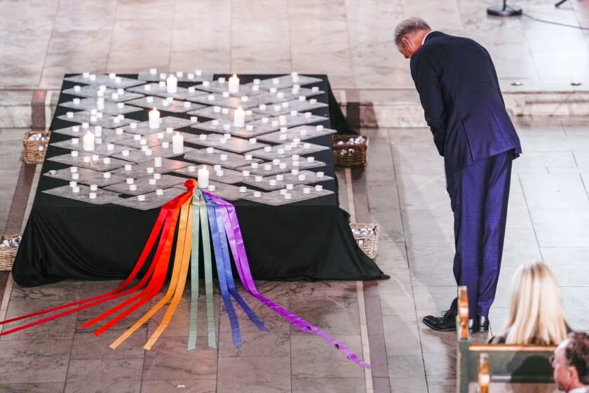 Prime Minister Jonas Gahr Store pays respect during a service in Oslo Cathedral, Oslo, Sunday June 26, 2022, after an attack in Oslo on Saturday. A gunman opened fire in Oslo's nightlife district early Saturday, killing two people and leaving more than 20 wounded in what the Norwegian security service called an "Islamist terror act" during the capital's annual LGBTQ Pride festival. (Javad Parsa/NTB via AP)