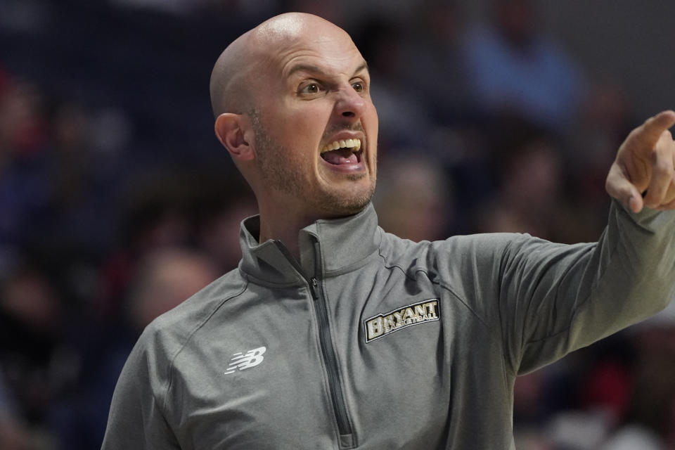 Bryant head coach Phil Martelli Jr., calls to his team during the second half of an NCAA college basketball game against Mississippi, Sunday, Dec. 31, 2023, in Oxford, Miss. (AP Photo/Rogelio V. Solis)