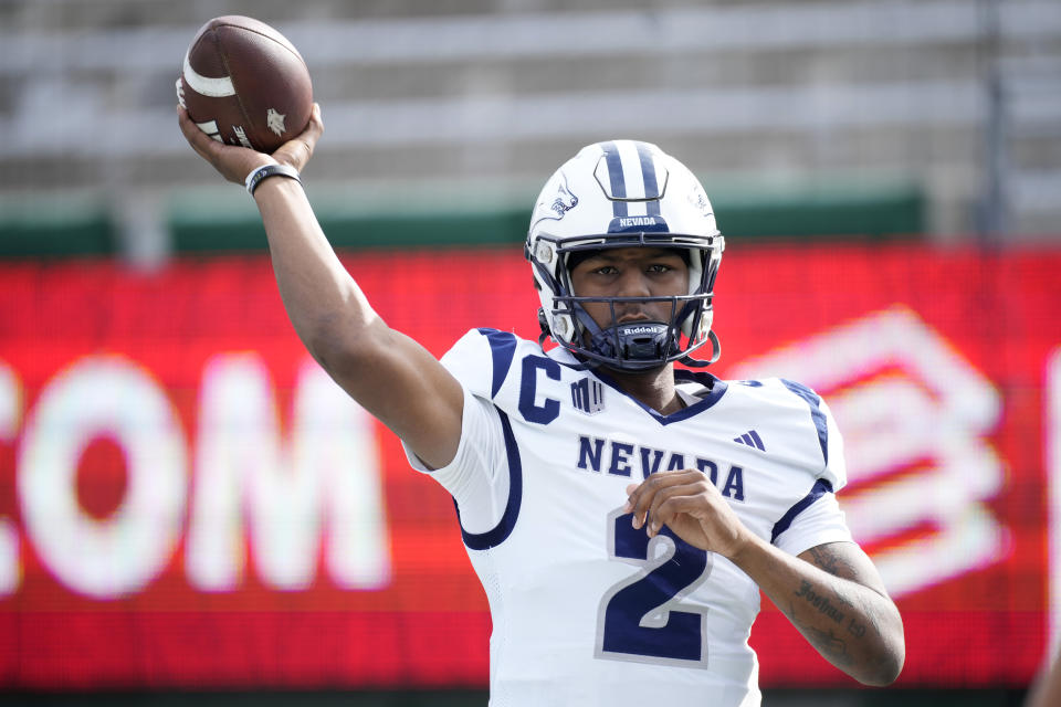 Nevada quarterback Brendon Lewis warms up before an NCAA college football game against Colorado State, Saturday, Nov. 18, 2023, in Fort Collins, Colo. (AP Photo/David Zalubowski)