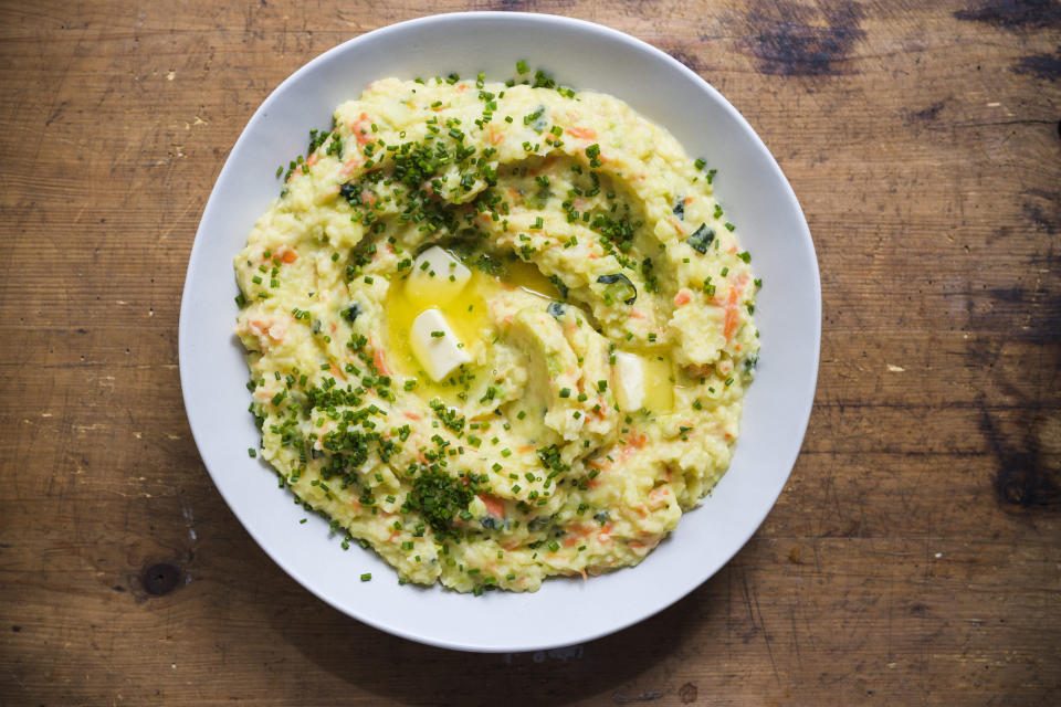 This image released by Milk Street shows a recipe for Belgian mashed potatoes with winter vegetables. (Milk Street via AP)