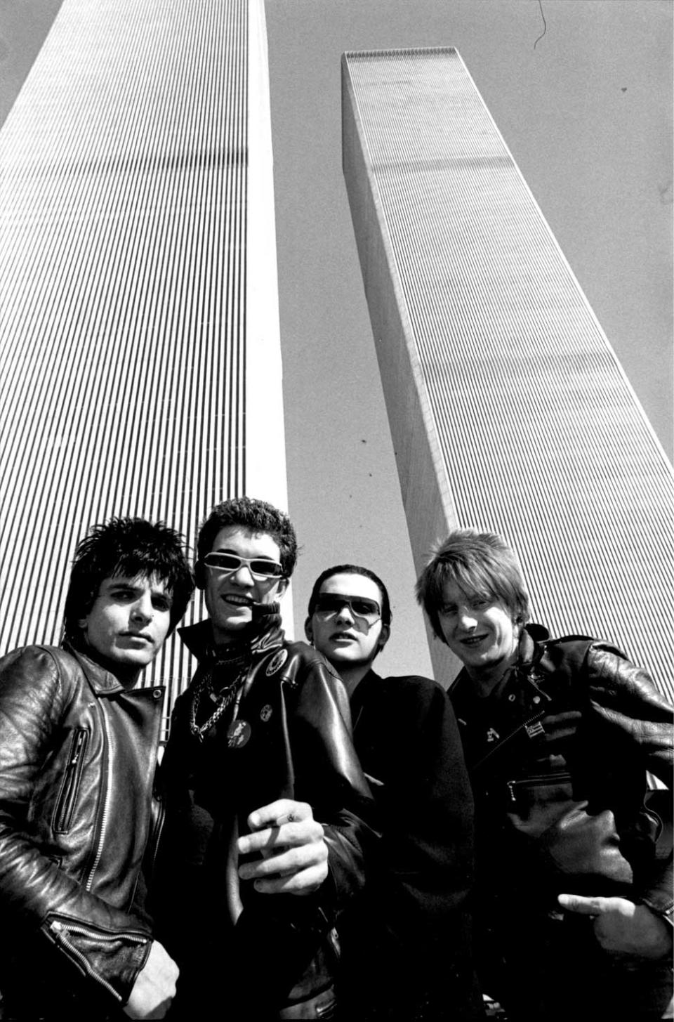 The Damned standing in front of the Twin Towers in New York