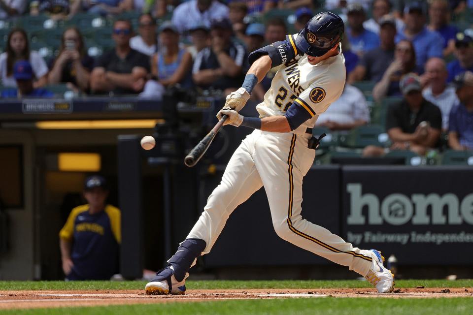 MILWAUKEE, WISCONSIN - JULY 06: Christian Yelich #22 of the Milwaukee Brewers swings at a pitch during the first inning against the Chicago Cubs at American Family Field on July 06, 2022 in Milwaukee, Wisconsin. (Photo by Stacy Revere/Getty Images)