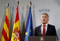 Spain's acting Interior Minister Fernando Grande-Marlaska speaks at a news conference after holding meeting with police commanders in charge of the police operation in Catalonia, in Barcelona