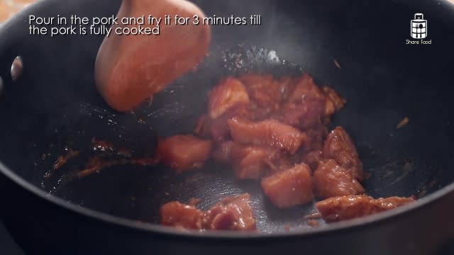 Frying diced marinated pork