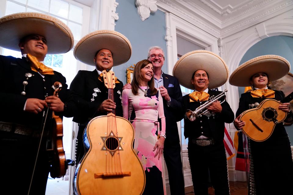 First Lady Tammy Murphy and Gov. Phil Murphy pose with El Charro de Oro y su Mariachi during the Hispanic heritage month celebration at Drumthwacket on Sept. 26, 2023, in Princeton.