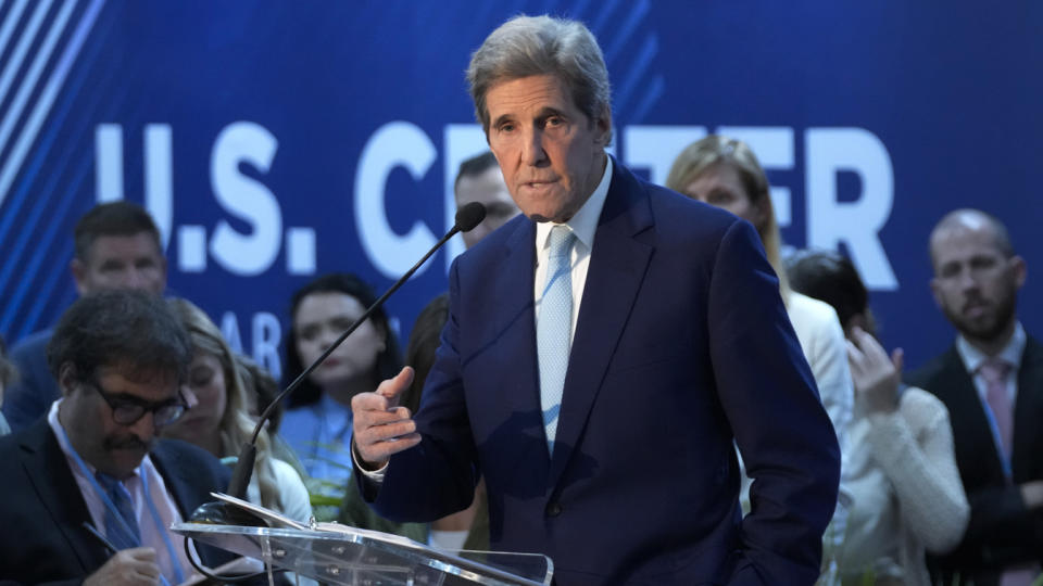 Special presidential envoy for climate John Kerry speaks at a podium.