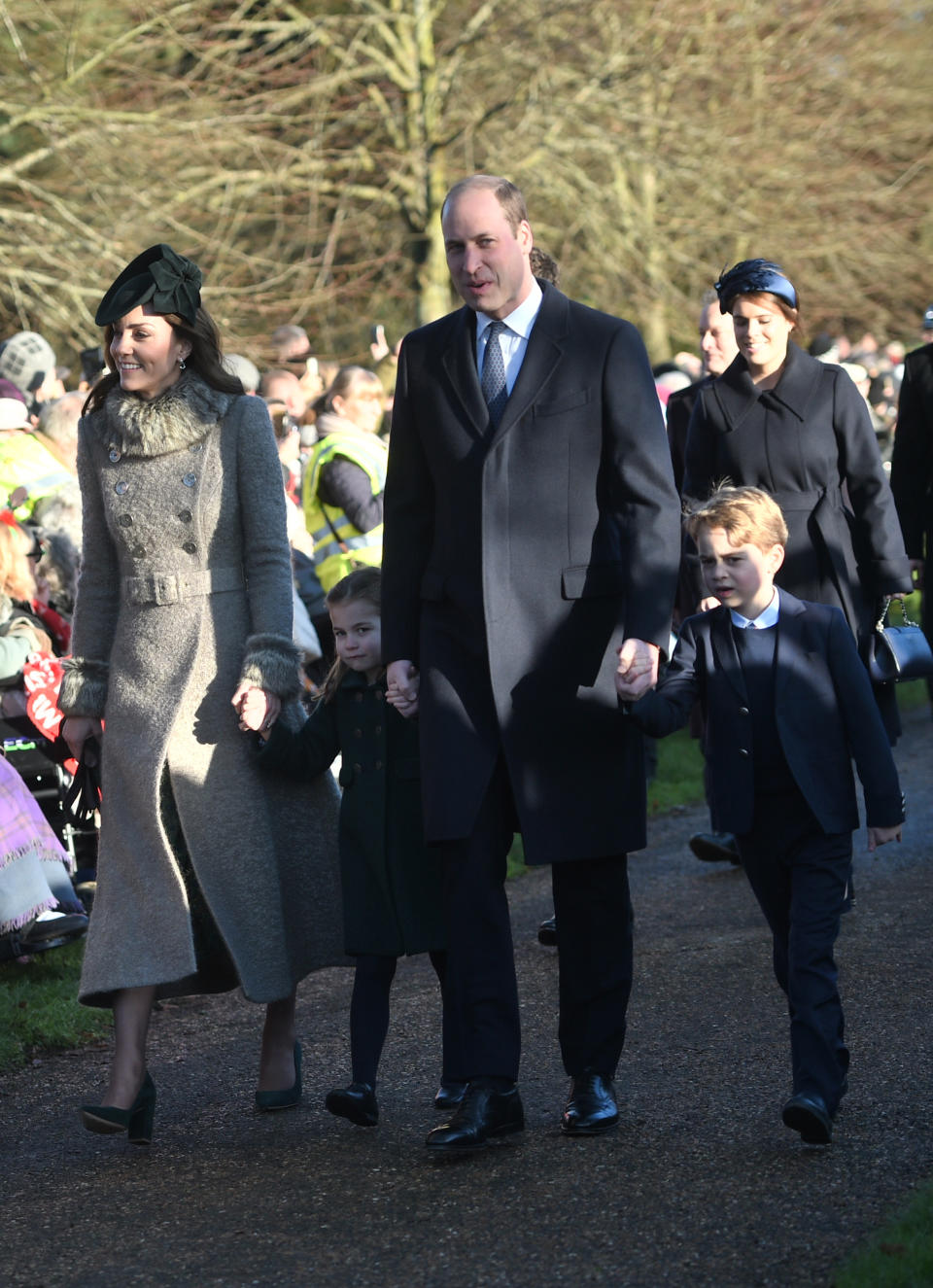 The Duke and Duchess of Cambridge and their children Prince George and Princess Charlotte arriving to attend the Christmas Day morning church service. [Photo: PA]
