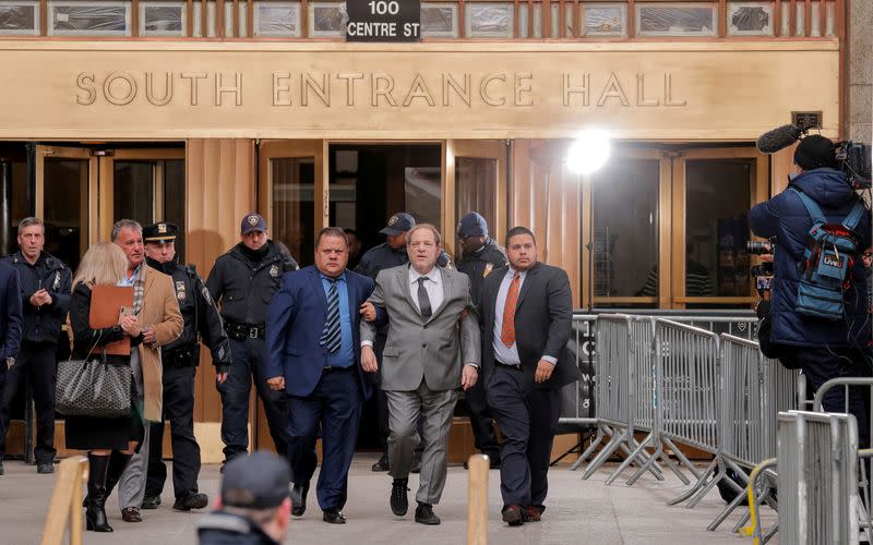 FILE PHOTO: Film producer Harvey Weinstein exits following a hearing in his sexual assault case at New York State Supreme Court in New York