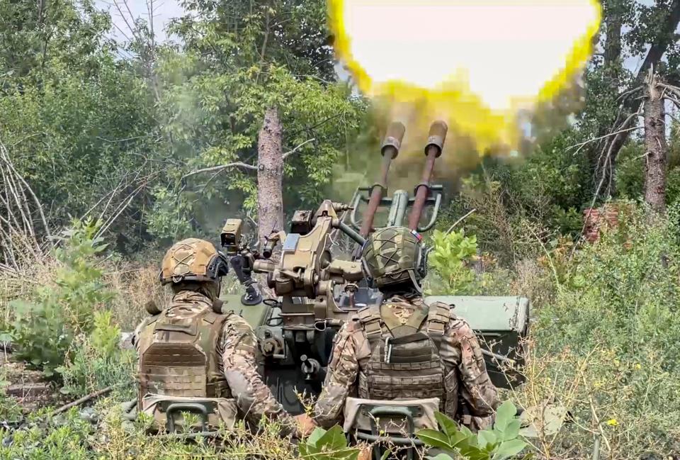 A Russian air defence crew uses a 23-mm anti-aircraft mounts ZU-23-2 to fire at Ukrainian attack drones at an undisclosed location in Russia (EPA)