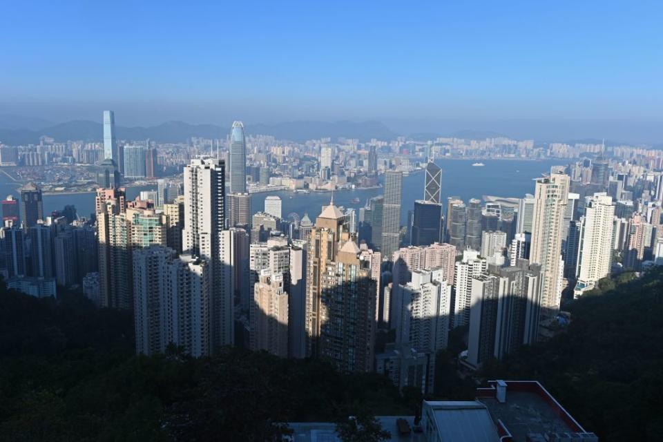 This picture taken on November 27, 2019 shows the Hong Kong skyline as seen from a lookout point on the city's Peak district. 