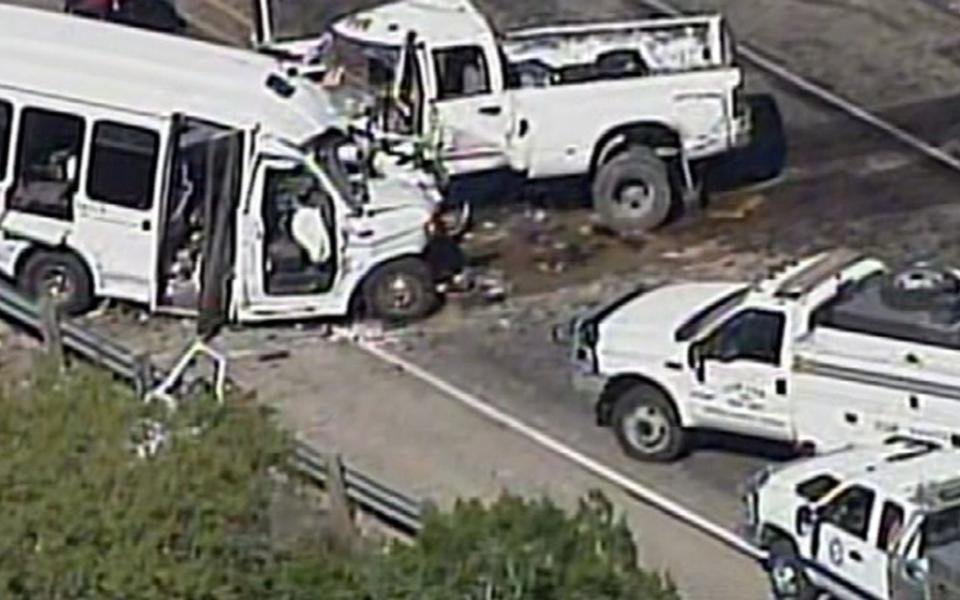 A still image of aerial video is shown of an accident scene involving a Texas church bus carrying senior citizens which crashed head-on with another vehicle - Credit: Reuters