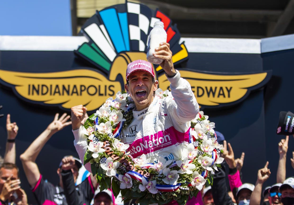 May 30, 2021; Indianapolis, Indiana, USA; IndyCar Series driver Helio Castroneves celebrates after winning the 105th Running of the Indianapolis 500 at Indianapolis Motor Speedway. Mandatory Credit: Mark J. Rebilas-USA TODAY Sports