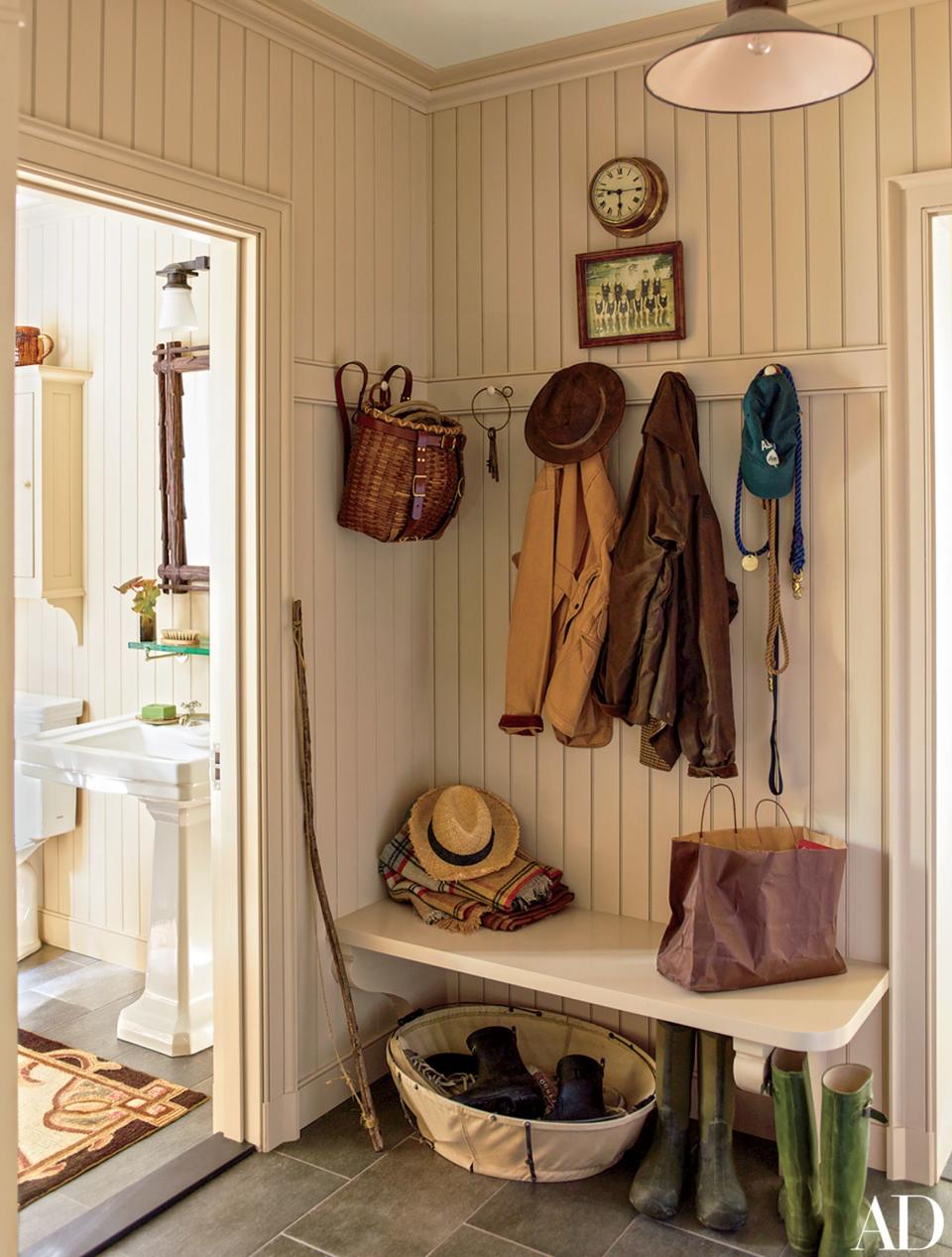 The design team at G.P. Schafer Architect added beadboard paneling to the mudroom of a Lake Placid, New York, home.