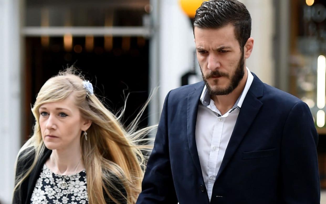 Charlie Gard's parents Connie Yates and Chris Gard outside the High Court on Friday morning  - PA