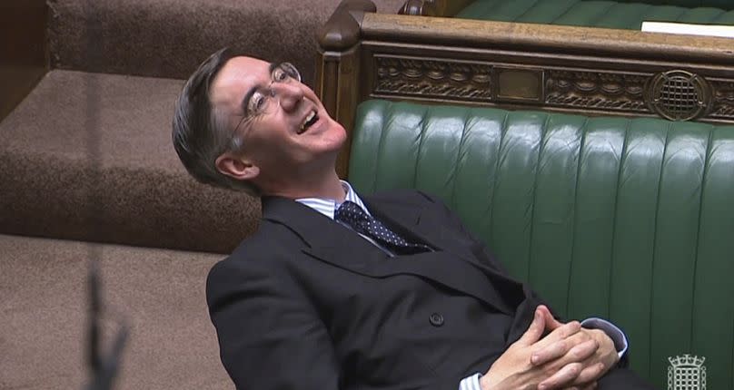 Rees-Mogg lounging in his seat during a debate on Brexit in the House of Commons, Sept 3, 2019