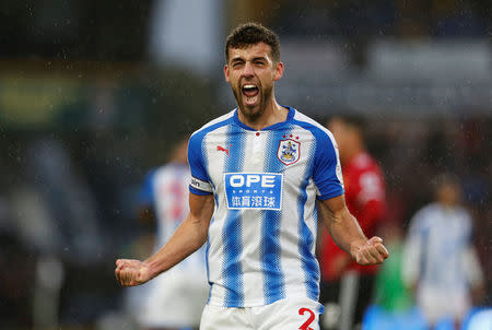 Soccer Football - Premier League - Huddersfield Town vs Manchester United - John Smith's Stadium, Huddersfield, Britain - October 21, 2017 Huddersfield Town’s Tommy Smith celebrates at the end of the match Action Images via Reuters/Ed Sykes