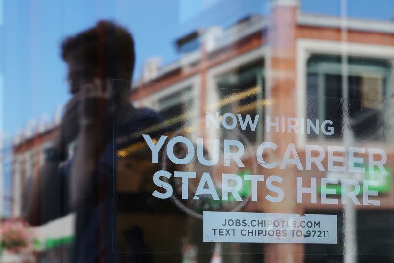 FILE PHOTO: A Chipotle restaurant advertises it is hiring in Cambridge, MA