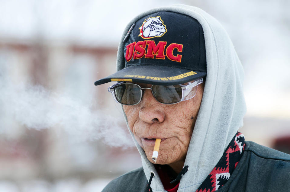 In this Thursday, Feb. 6, 2014 photo is Andrew Littlemoon Jr., 57, a disabled military veteran rents a home on the Standing Rock Reservation in Fort Yates, N.D. Littlemoon Jr., 57, said he worries about maintaining a propane supply through the end of the winter. (AP Photo/Kevin Cederstrom)