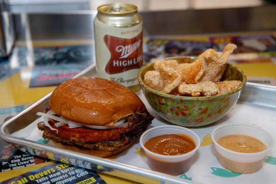 The trout bologna and cheese sandwich with pork rinds from Good Hot Fish, January 19, 2024.