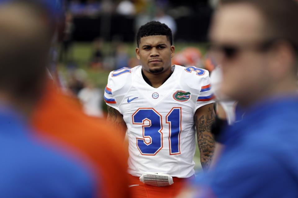 Florida CB Teez Tabor is having to answer for off-field concerns to NFL teams. (AP)