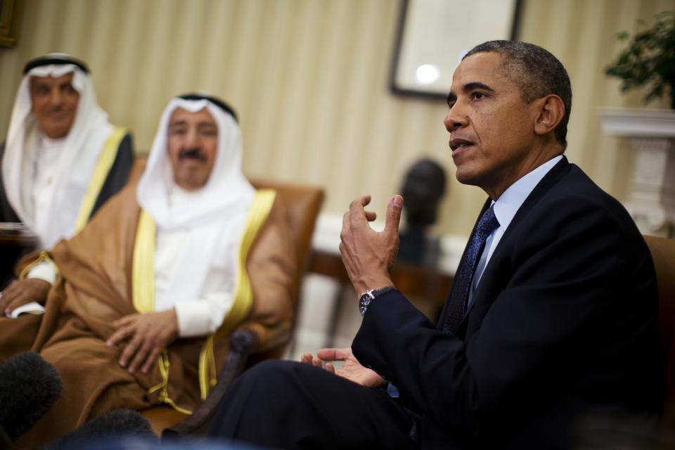 U.S. President Barack Obama meets Sheikh Sabah al-Ahmad al-Jaber al-Sabah, Kuwait's emir, in the Oval Office of the White House in Washington, September 13, 2013. Obama said on Friday that he hopes talks on a plan to destroy Syria's chemical weapons are successful, but said that he will insist any deal is "verifiable and enforceable." REUTERS/Jason Reed (UNITED STATES - Tags: POLITICS CONFLICT)