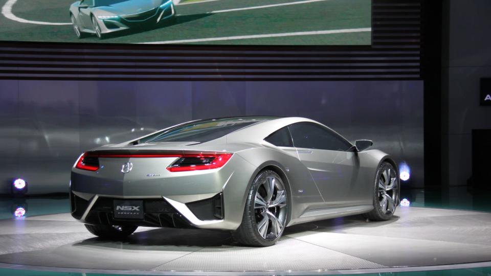 Announcing the rebirth of the Honda NSX, one of the most iconic sports cars of the 1990s, which will return in 2015 an American-built, rear-engined Acura with all-wheel-drive. Here's something to get excited for. The NSX represented the pinnacle of Honda's sports heyday of the 1980s and '90s. Launched with input from Formula One great Ayrton Senna, the NSX set a brace of technological firsts -- from its aluminum monocoque frame to the variable valve timing that would become a standard on engines worldwide. The NSX wasn't the fastest or most-powerful supercar, but reflected Honda's balance between power, weight and handling -- a sweet spot that few cars have ever acheived.