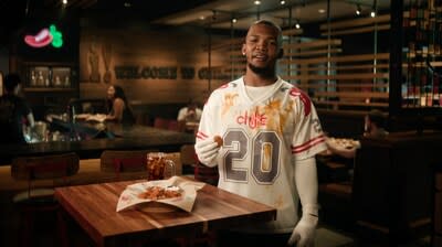 Sauced and Signed: Tony Pollard 'Wing Worn' Chili's Jerseys will