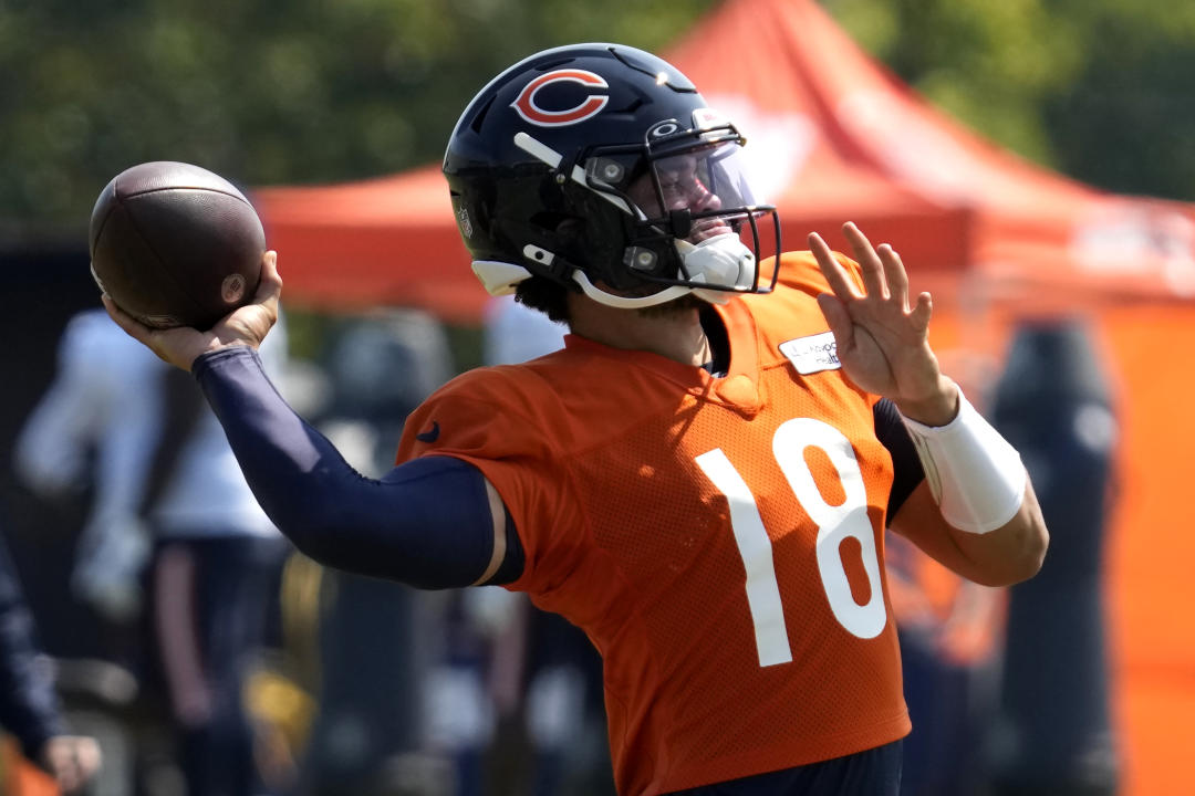 Chicago Bears quarterback Caleb Williams throws a ball during an NFL football training camp practice in Lake Forest, Ill., Saturday, July 27, 2024. (AP Photo/Nam Y. Huh)