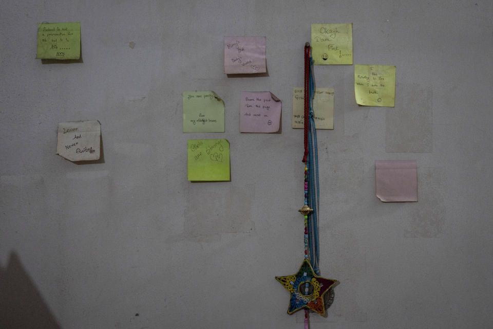 Post it notes written by Hafsa Islam Raita, 16, are seen stuck on the wall of her room which once belonged to her father Sajedul Islam, an opposition BNP local politician who has been missing for over 10 years, in Dhaka, Bangladesh, Thursday, Jan. 4, 2024. His family say he was picked up by agents of Bangladesh's Rapid Action Battalion, a special security force unit, on 4 Dec. 2013, just days before the 2014 general election. Hafsa was six when her father disappeared. (AP Photo/Altaf Qadri)