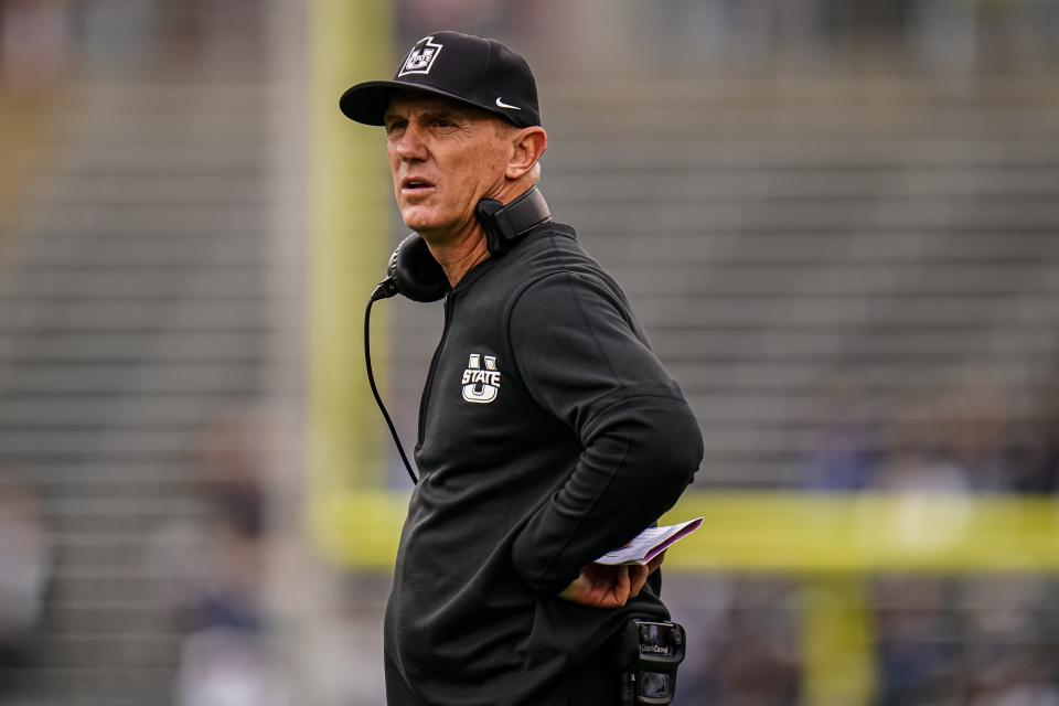 Utah State Aggies head coach Blake Anderson watches from the sideline as they take on the UConn Huskies at Rentschler Field at Pratt & Whitney Stadium