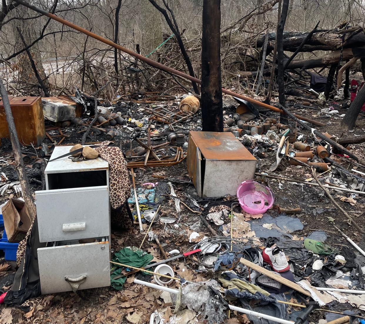 Trash has returned to the woods next to Portage Manor in South Bend, where a cleanup is being organized for March 23, 2023.