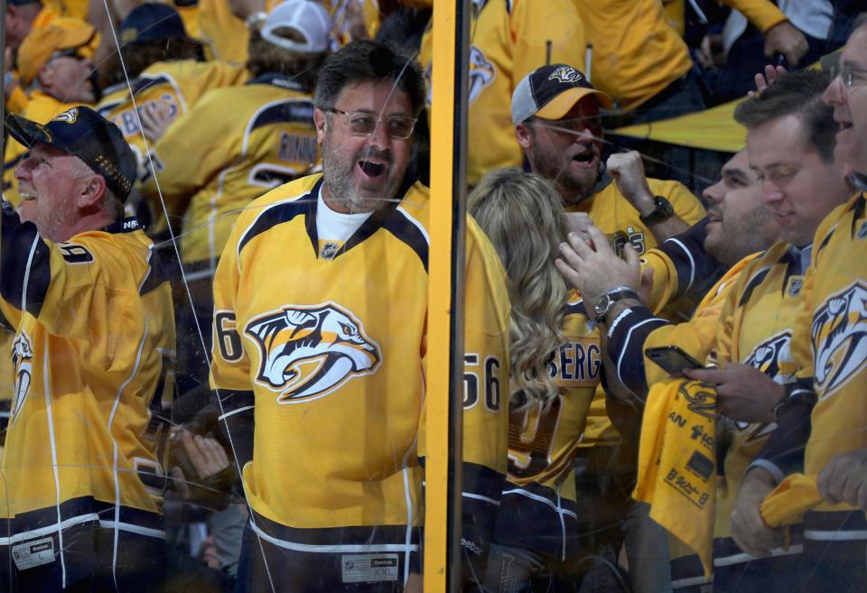 <p>Country legend Vince Gill celebrates a goal by the Nashville Predators during Game 4 of the Stanley Cup Final. (Dave Sandford/NHLI via Getty Images) </p>