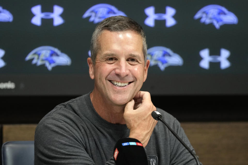 Baltimore Ravens head coach John Harbaugh speaks at an NFL press conference at the Tottenham Hotspur training ground in London, Friday, Oct. 13, 2023, ahead of the NFL game against Tennessee Titans at the Tottenham Hotspur stadium on Oct. 15, 2023. (AP Photo/Kirsty Wigglesworth)