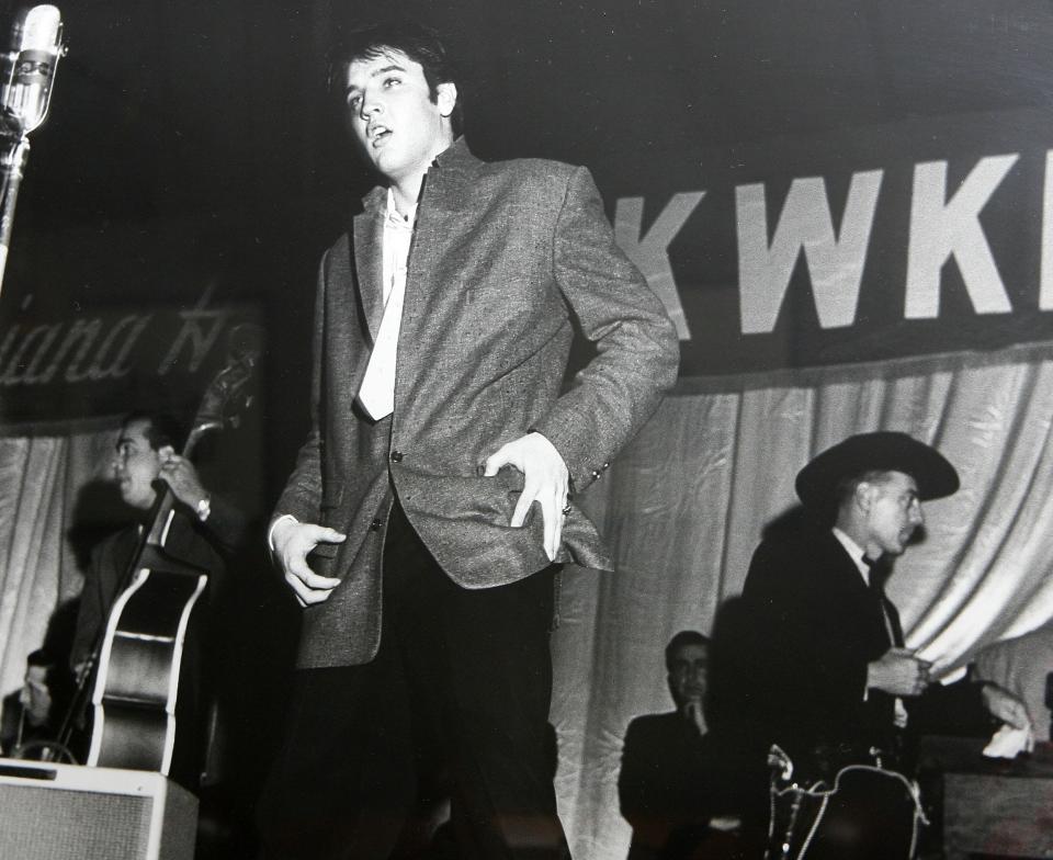 A new exhibit is going up at Masur Museum in Monroe, La., that features photographs of a young Elvis Presley on the stage of the Louisiana Hayride in Shreveport, La. The show focuses on 40 black and white photographs taken by Shreveport photojournalists Jack Barham and Langston McEachern, most depicting Elvis in his final performance in Shreveport on Dec. 15, 1956. (AP Photo,file) 