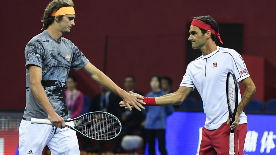 Alexander Zverev and Roger Federer, pictured here in action on the tennis court.